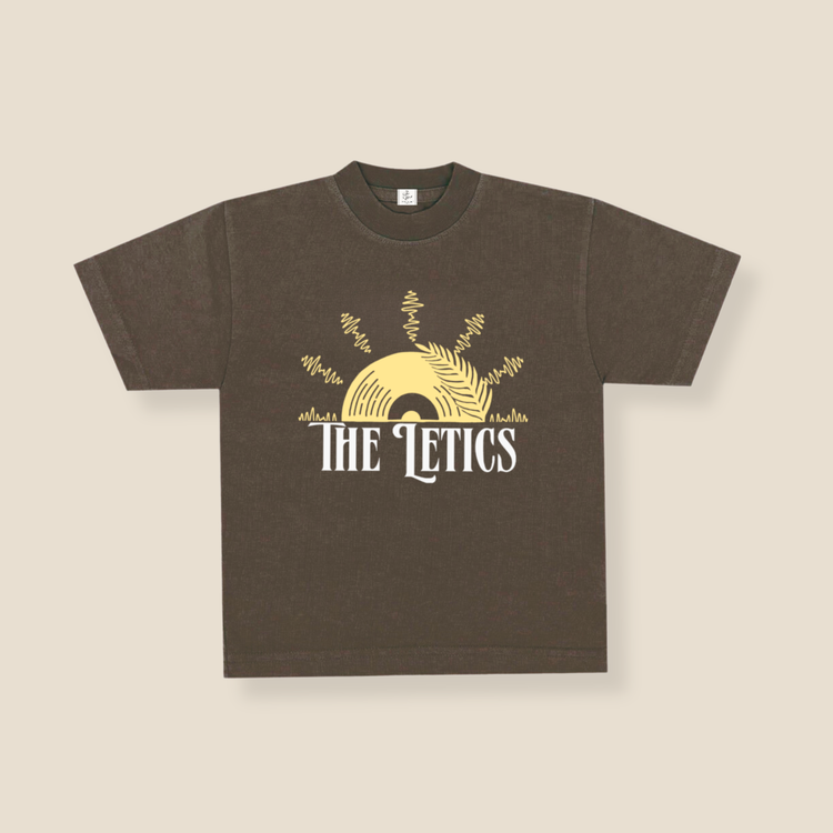 Brown t-shirt with 'The Letics' logo on a beige background