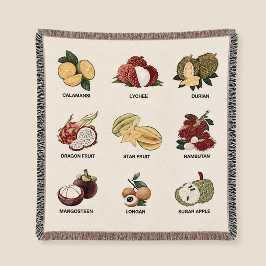Blanket with illustrations of various tropical and exotic fruits and their names on a beige background. Calamansi, Lychee, Durian, Dragon Fruit, Star Fruit, Rambutan, Mangosteen, Longan, Sugar Apple.
