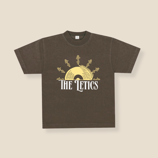 Brown t-shirt with 'The Letics' logo on a beige background